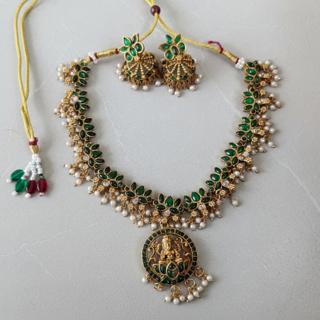 Ornate necklace with matching earrings