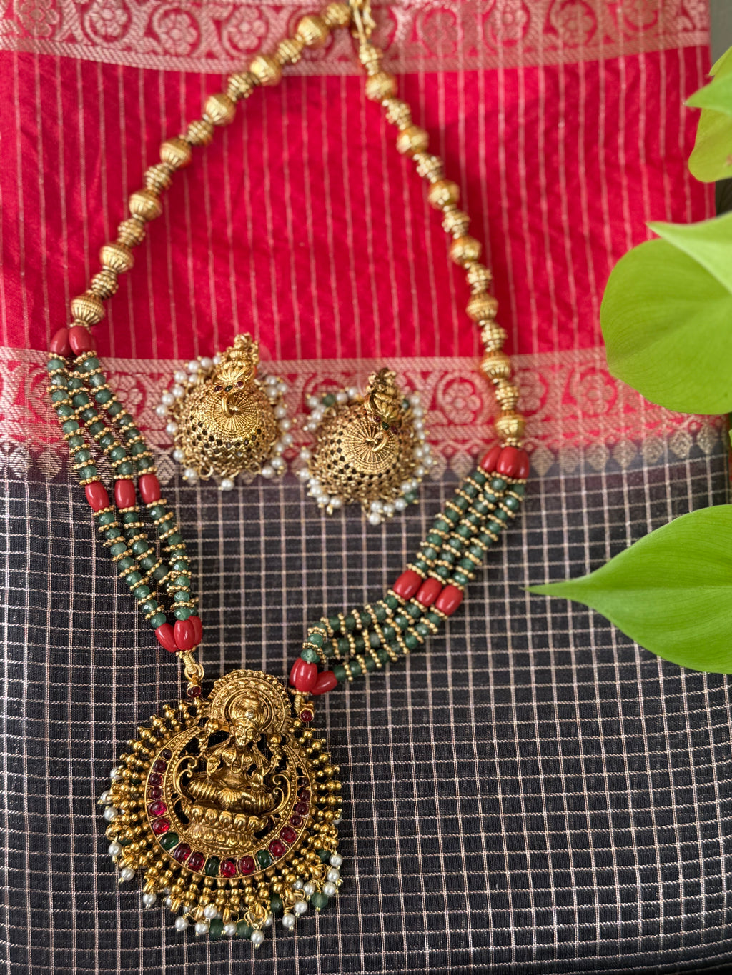 Gold Plated Temple Lakshmi Pendant Necklace Set with Jhumka Earrings
